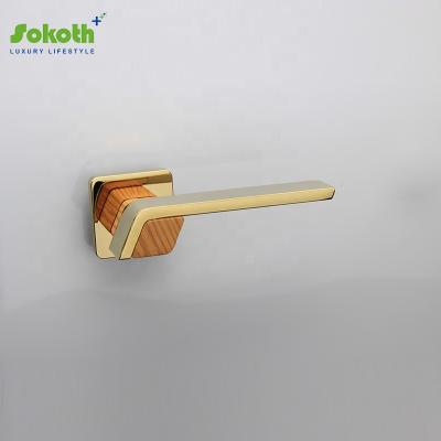 China Good Grain PVD Gold Plating Internal Wood Door Handle With Lock for sale