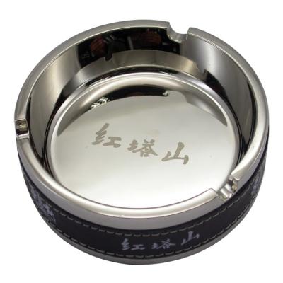 China Fashionable Retro China Metal Ashtray Round Ten Thousand Lighter Match Smokeless Ashtray for sale