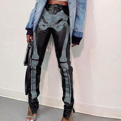 China Washable Stylish Skeleton Printed Faux PU Leather Patchwork Women Patchwork Denim Pants High Waisted Casual Streetwear Track Pants for sale