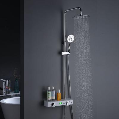 China Contemporary Wall Mounted Single Handle Bathroom Shower Faucet Shower Set With Storage Shelf for sale