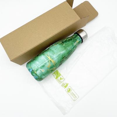 China PORTABLE Top Selling Double Wall Sports Drink Bottle Insulated Cola Shape Stainless Steel Custom Water Bottle With Biodegradable Bag for sale