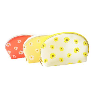 China Durable Shell Style Imitated TPU Cosmetic Bag Toiletry Bag Makeup Pouch With Daisy Patterns for sale