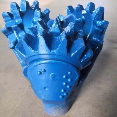 China Rotation Api Three Cones Bit Oil Well Drilling Bit IADC 115 117 127 for sale