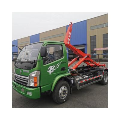 China Building Material Stores SINOTRUK Detachable Hook Arm Container Dump Garbage Truck for sale