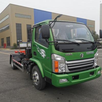 China Building Material Stores Sinotruk CDW High Efficiency Hook Arm Electric Garbage Truck for sale