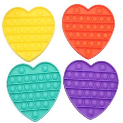 China Bulk Assorted Silicone Heart Flower Rainbow Mover Toys Soft Noise Bubble Pushing Silicone Sensory Mover Stress Release Toy for sale