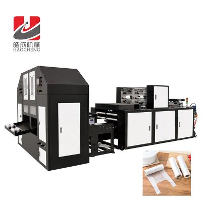 China Hotels Automatic Plastic T Shirt Rolling Bag Making Machine for sale