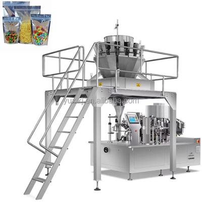 China Automatic dried fruit candy vegetable nuts multihead frozen weigher stand up zipper bag packing machine for sale