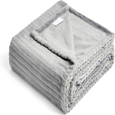 China Waterproof Ready To Ship Jacquard Soft Warm Thick Flannel Fleece Blanket Winter Throw Blanket Comforter Blanket for sale