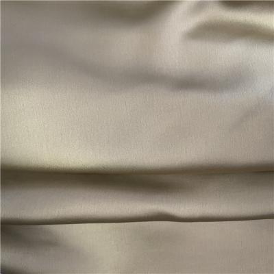 China Shiny 100% organic poly satin fabric with good hand feel fashion dyed fashion garment by design for sale