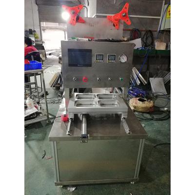 China Food To Keep Fresh Meal Trays Many Days Automatic Packaging Machine Container Seal Machine For Meals for sale