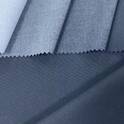 China High Quality Breathable Polyester Rayon Plaid Fabric Woven Elastic Yarn Dyed Brushed Fabric Men's Pants Fabric Types for sale