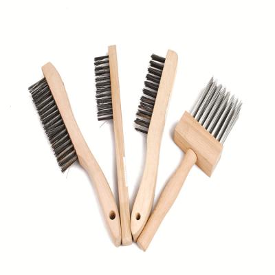 China Carbon steel cleaning wire brush with curved wooden handle for sale