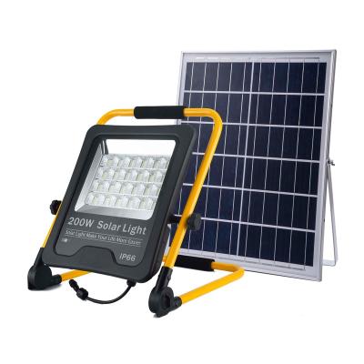 China Solar Powered Portable Garden Stand Light Mobile Phone Charging Emergency Light Projection Solar Outdoor Camping Warning Light for sale