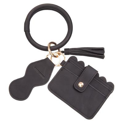 China Key Holder Women PU Leather Key Ring Wrist Strap Removable Lipstick Bag Chain for sale