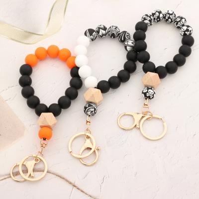 China Key Holder Halloween Silicone Beads Key Chain For Keys Accessories Tassel Wrist Bracelet Key Chain for sale