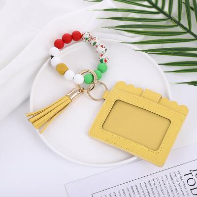 China Wholesale Key Holder Wallet Silicone Beaded Leather Key Ring Card Holder Handbag Wristband Tassel Purse Car for sale