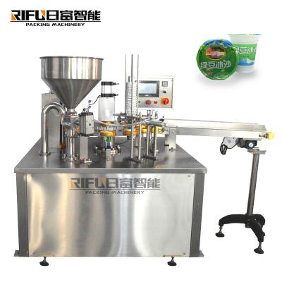 China Automatic Jelly Yogurt Ice Cream Juice Sugar Honey Rotary Cup Filling Capping Sealing Machine for sale