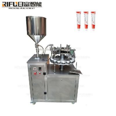 China Semi-automatic eye cream aluminum tube folding, filling and sealing machine for sale