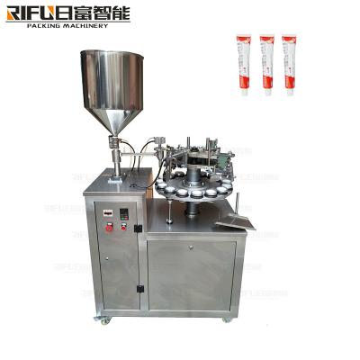 China Semi-automatic glue folding tail aluminum tube filling and sealing machine for sale