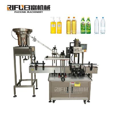 China Automatic Pet Bottle Cap Tightening Machine/twist off capping machine/Pet Bottle Screw Capping Machine en venta