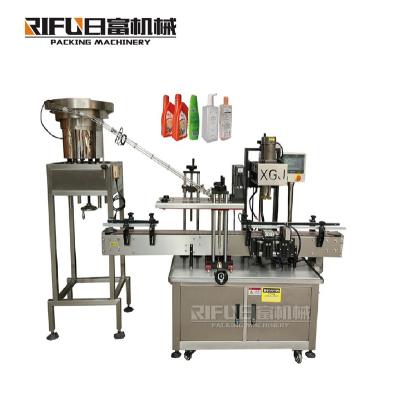 China high quality automatic capping machine for plastic bottle lid/spray lid with good price for Manufacturing Plant en venta