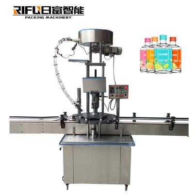 China High speed Automatic capping machine glass bottle jar capping machine for snack food factory en venta