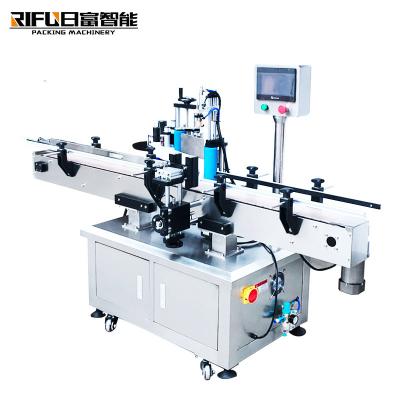 China Automatic round bottle flat bottle square bottle labeling machine side positioning labeling machine for sale