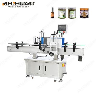 China Automatic Labeling Machine Adhesive Sticker Round can Labeling Machine can labeller for honney liquid for sale