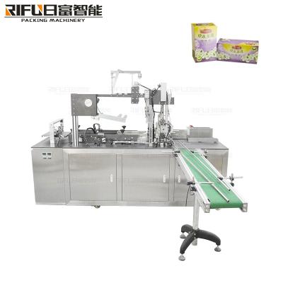 China Toothpaste seafood box Bopp film cellphone packing machinery Automatic cellophane wrapping machine for sale