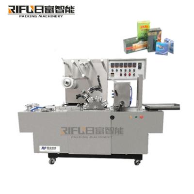 China Automatic cellophane wrapping machine boxes with cellophane film overapping machine transparent film for sale