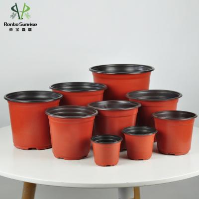 China CLASSIC Color Sunrise Ronbo Wholesale Plastic Garden Greenhouse Double Round Nursery Flower Pots for sale