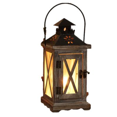 China Eco-friendly Simple Cross Stand Luxury Wedding Design Pattern Flower Lantern Wooden Candle Holder for sale