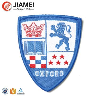 China Viable Iron On Soccer Team Name Logo Machine Woven Custom Sport Cloth Patch And Badge For Uniform for sale