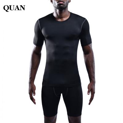 China Breathable Quick Dry Fitness Stitch Tights Men's Bodybuilding Tops Under Skin Muscle Gym Train Compression T-Shirt for sale