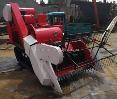 China Rice Ridding Type Mini Rice Harvester For Paddy Combine Harvester For Paddy Rice for sale