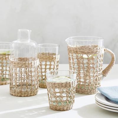 China Huangtu Selling Coffee Tea Water Clear Viable Transparent Glass Mug Cup Huangtu Glass Mug With Rattan Cup Holder for sale