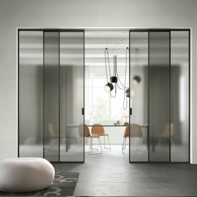 China Durable Bespoke Properties Black Frameless Glass Top Hanging Aluminum Sliding Door for sale