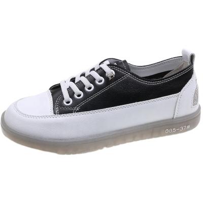 China Jelly Bottom Flat Sports Female Round Shoes Soft Genuine Leather Unique Casual Sneakers For Women for sale