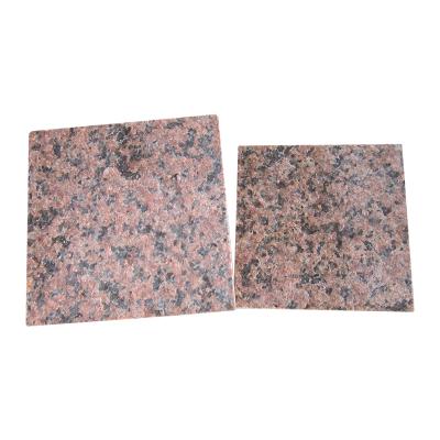 China Modern China Flamed Tianshan Exterior Cheap Red Granite Cobblestone for sale