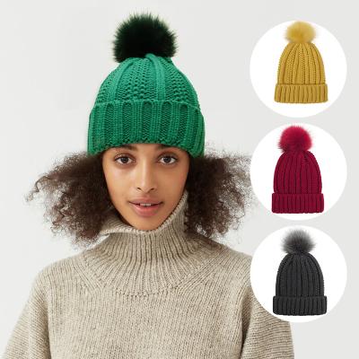 China JOINT Amazon Style Satin Striping Pom Pom Beanie Hat With Custom Logo for sale