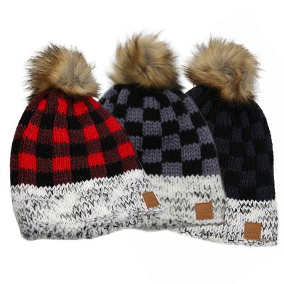 China Wholesale COMMON Skullcap Pom Pom Checked Jacquard Knitting Faux Fur Hats For Women for sale