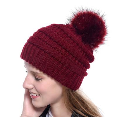 China Wholesale Custom Slouchy Pompom COMMON Beanie Hat Cap Logo Thick Chunky Cable Knit Adult Women Girls Solid Color With Big Fur Pom Pom for sale