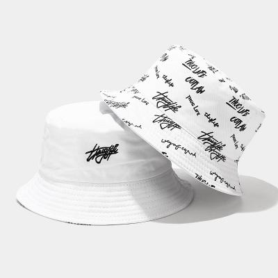 China Foldable Couturier Reversible Custom Logo Allover Printed and Cotton Fisherman Bucket Hat With Embroidered Private Label Label for sale