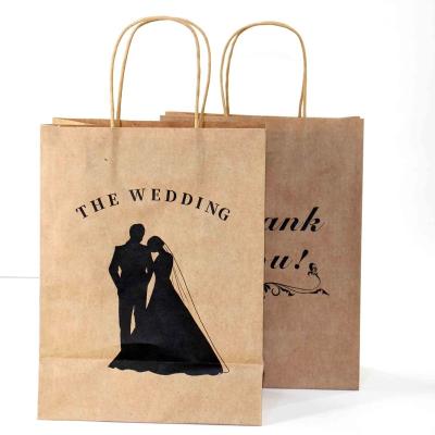 China Recycled Materials Wholesale Bulk Price Hot Selling Custom Luxury Kraft Paper Wedding Paper Bag for sale