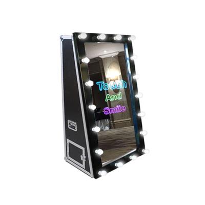 China Indoor Handing 55 Inch Multi Function Props Magic Selfie Mirror Photobooth for sale