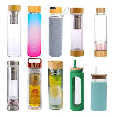 China Stocked Fruit Infused Colored Borosilicate Glass Silicone Water Bottle With Time Marker Glass Bamboo Lid With Custom Logo Straw for sale