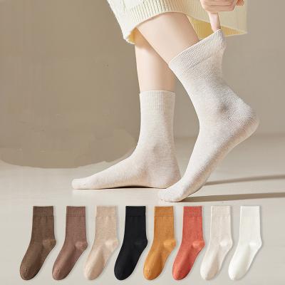 China Sporty 2024 high quality low MOQ 100% cotton socks men women custom logo crew socks Custom socks for sale