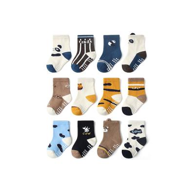 China Sporty rasta mushroom black grippies kids baby socks for sale