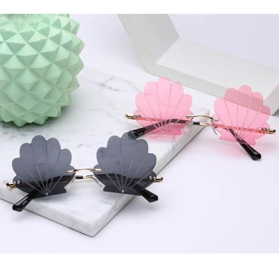 China Rimless Personality Shell Shape Rimless Sunglasses Shape Festival Party Candy Color Metal Frame Eyewear Unisex for sale